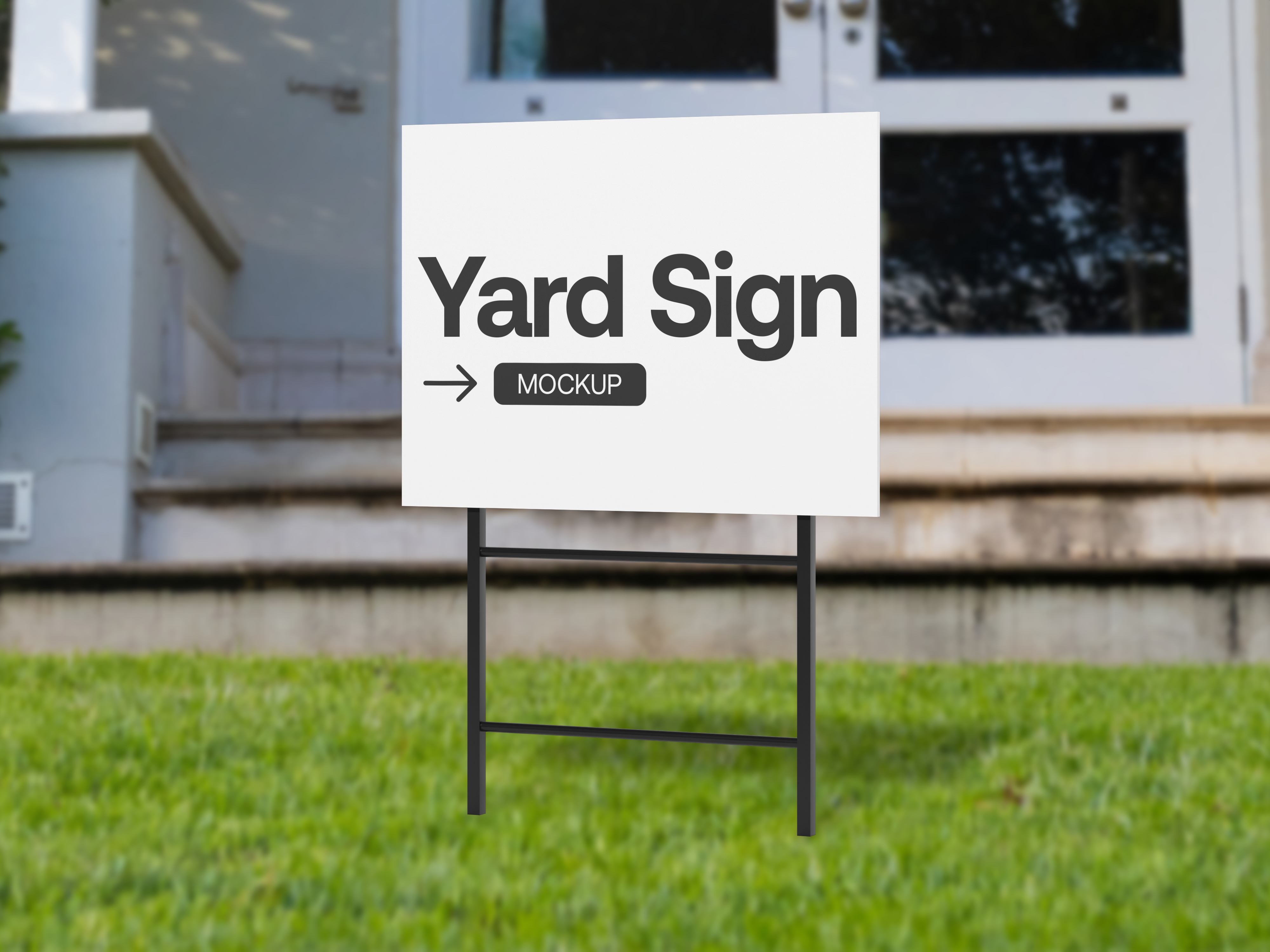 A campaign board sign standing on a front lawn